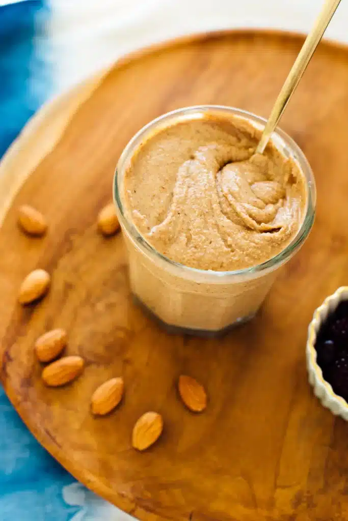 A top view of Almond nut butter on wooden board