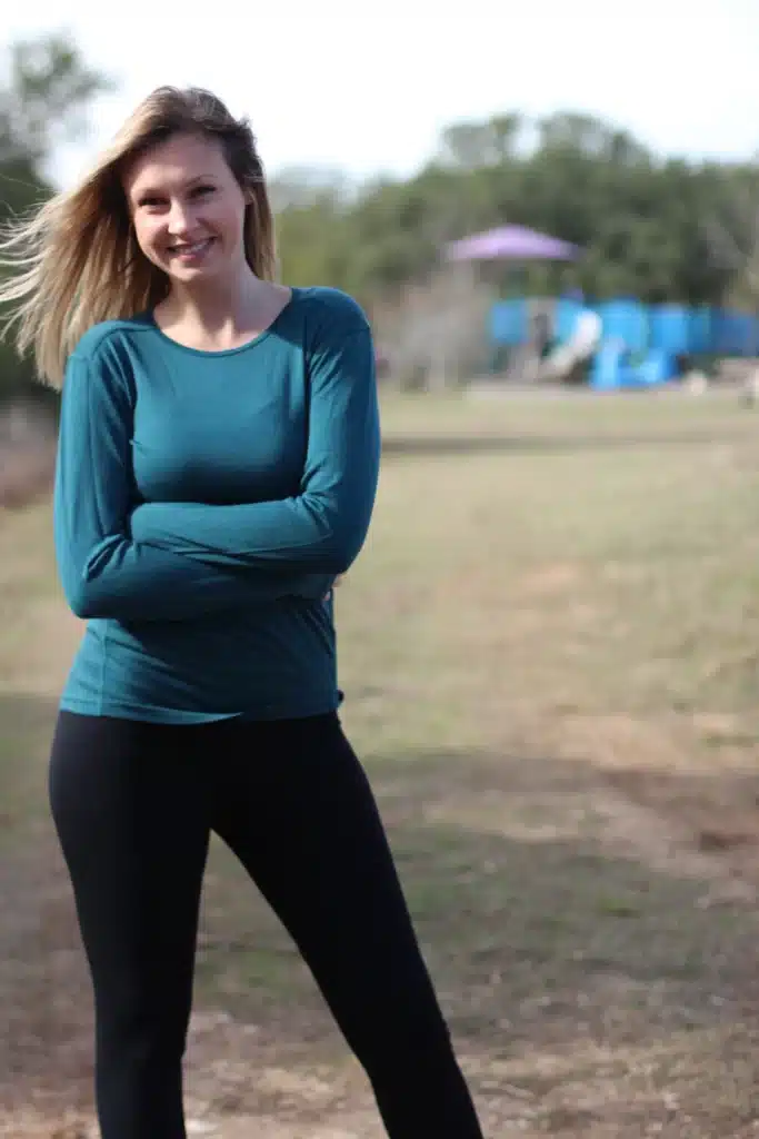 a girl styling merino wool shirt in blue color with crew neck