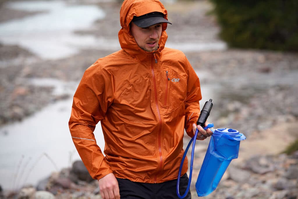 hiker wearing helium rain jacket