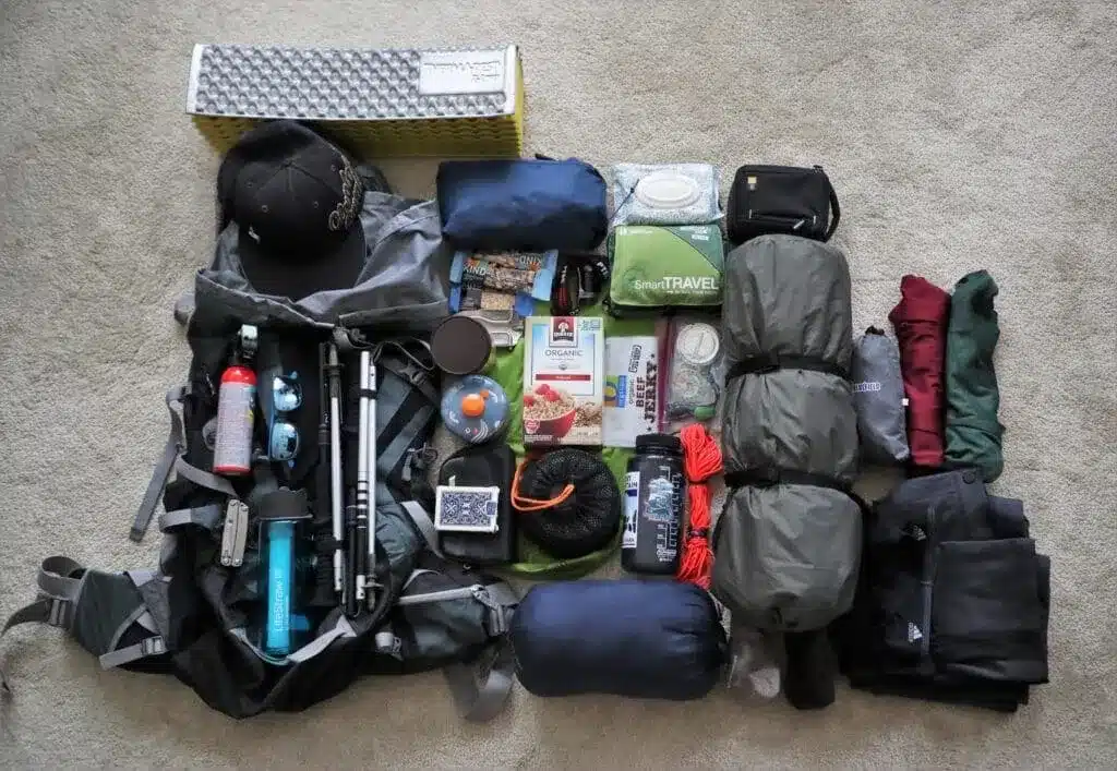 arranging the gear on a rug